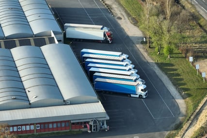 A-warehouse-aerial-view-with-parked-trucks